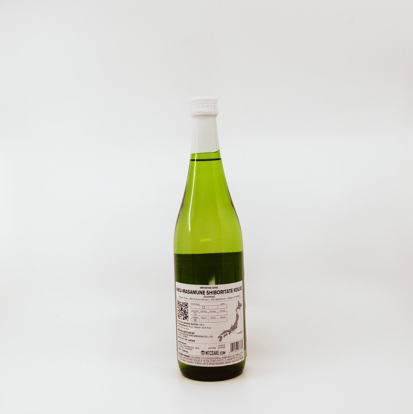 back of glass bottle with teal label