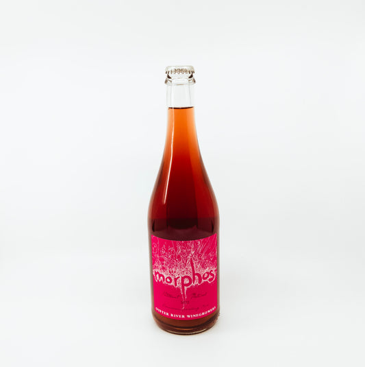 bottle with pink label with morphos written on it