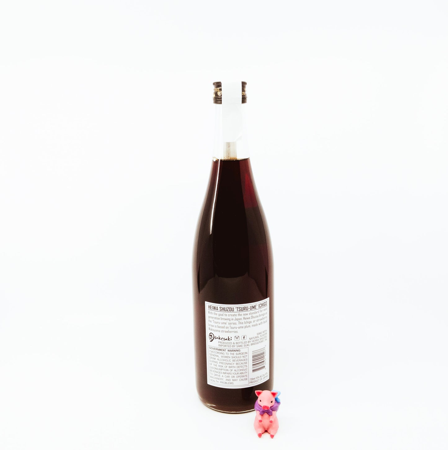 back of bottle with strawberry on label