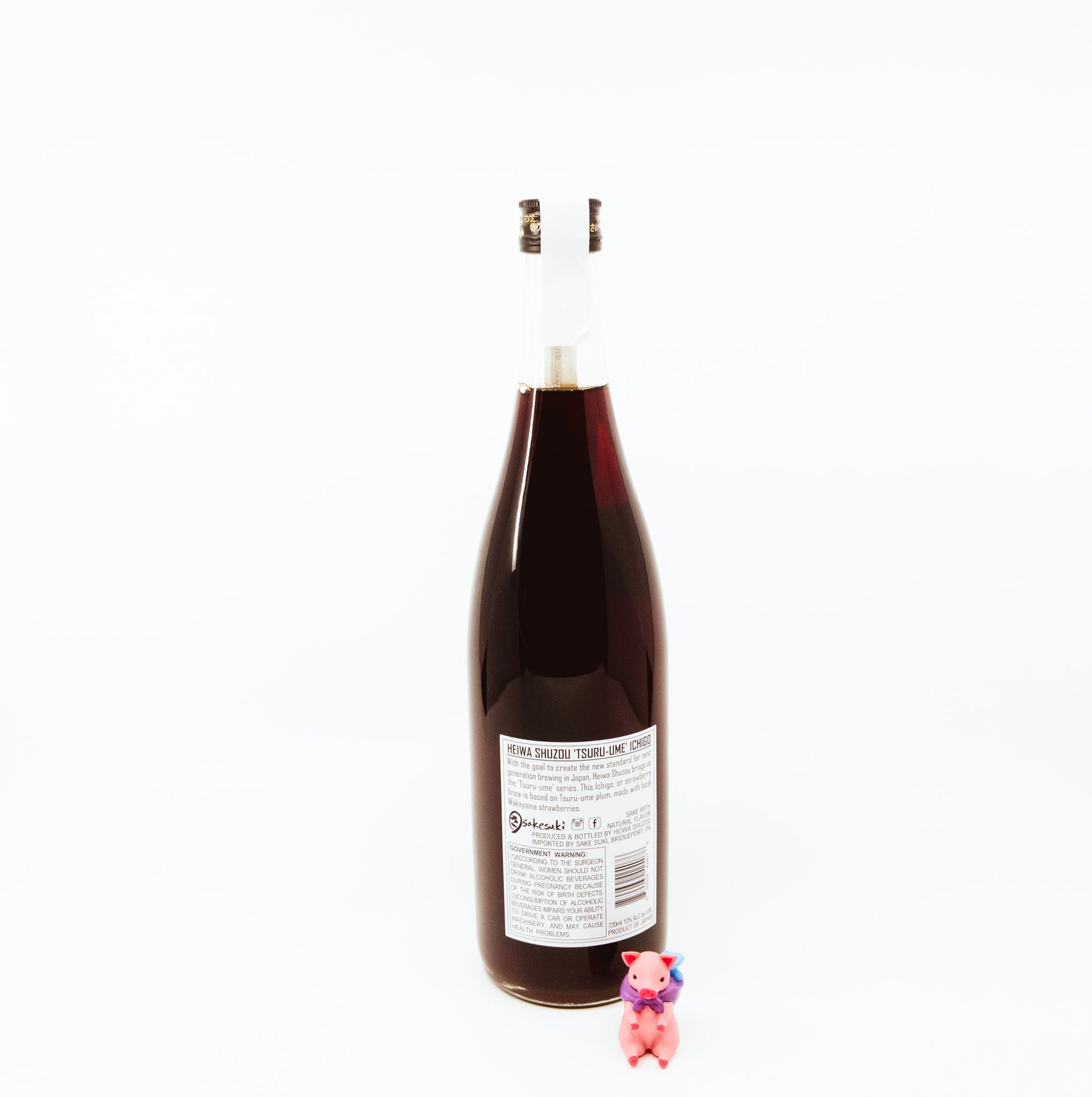 back of bottle with strawberry on label