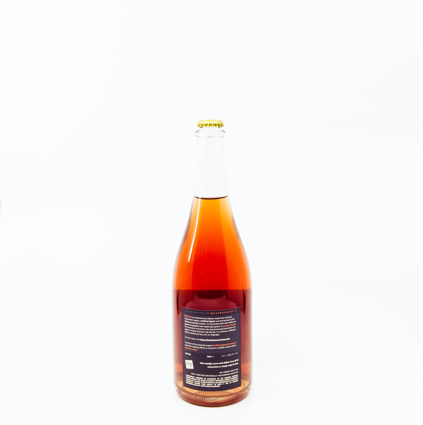 back of red glass bottle with moth on label