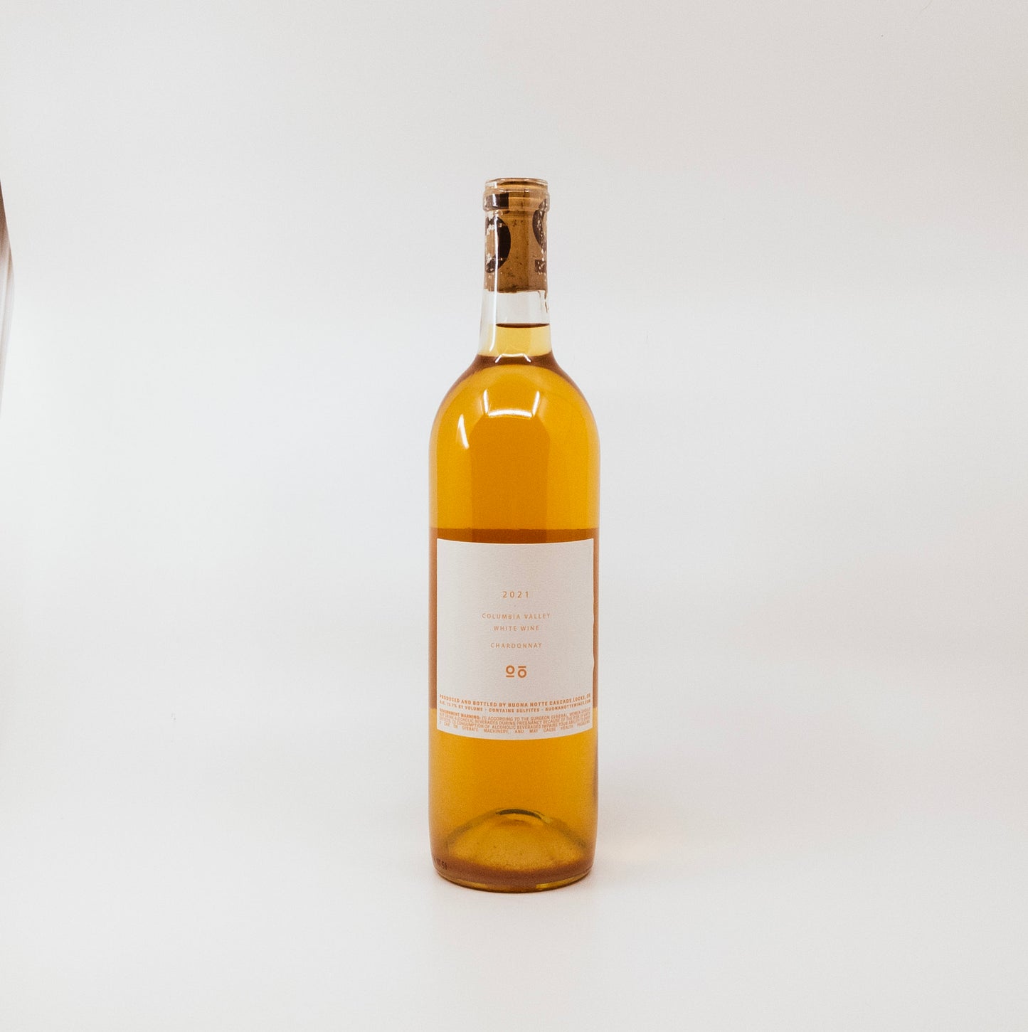 back of yellow wine bottle