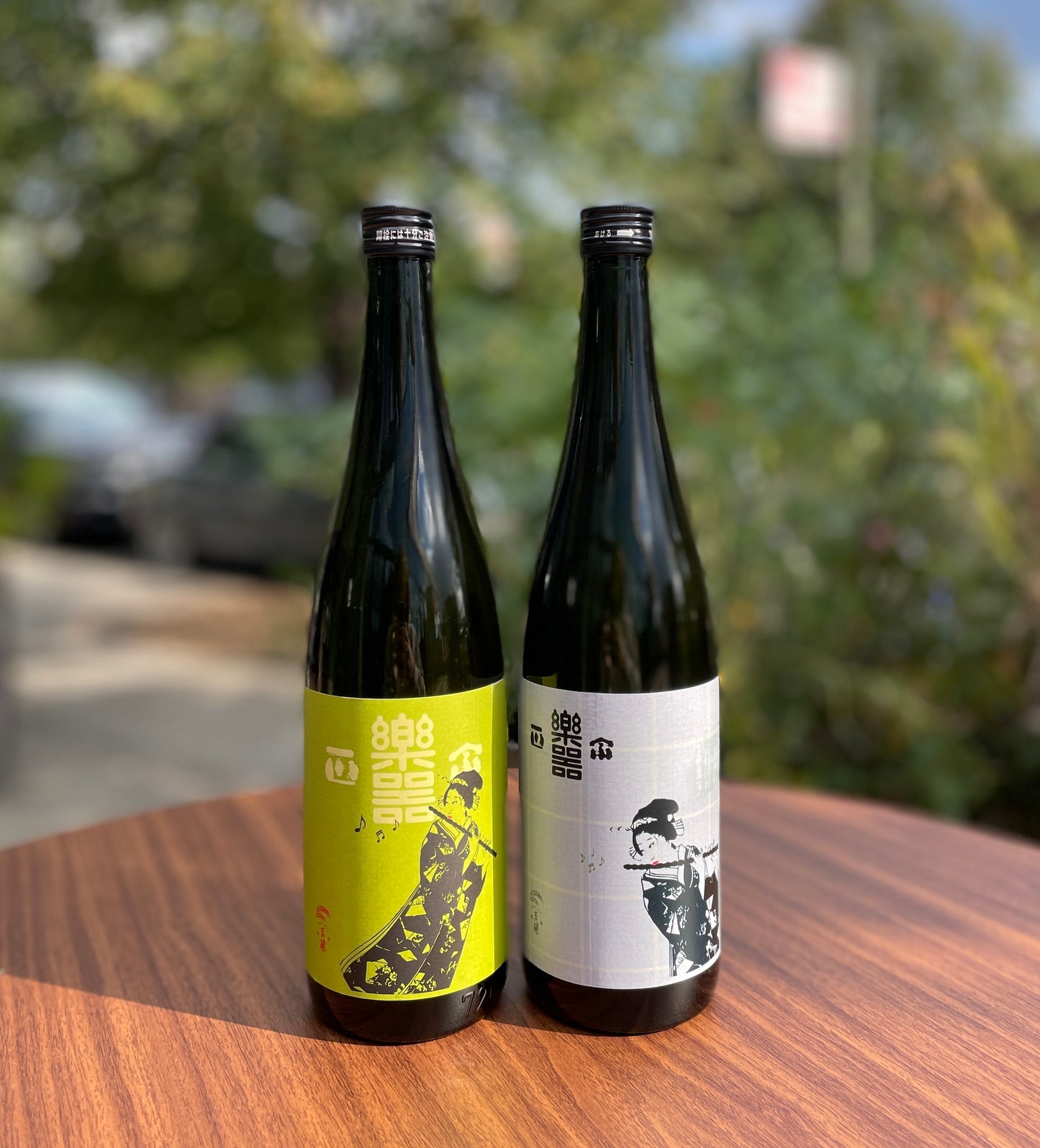 two bottles on wooden table