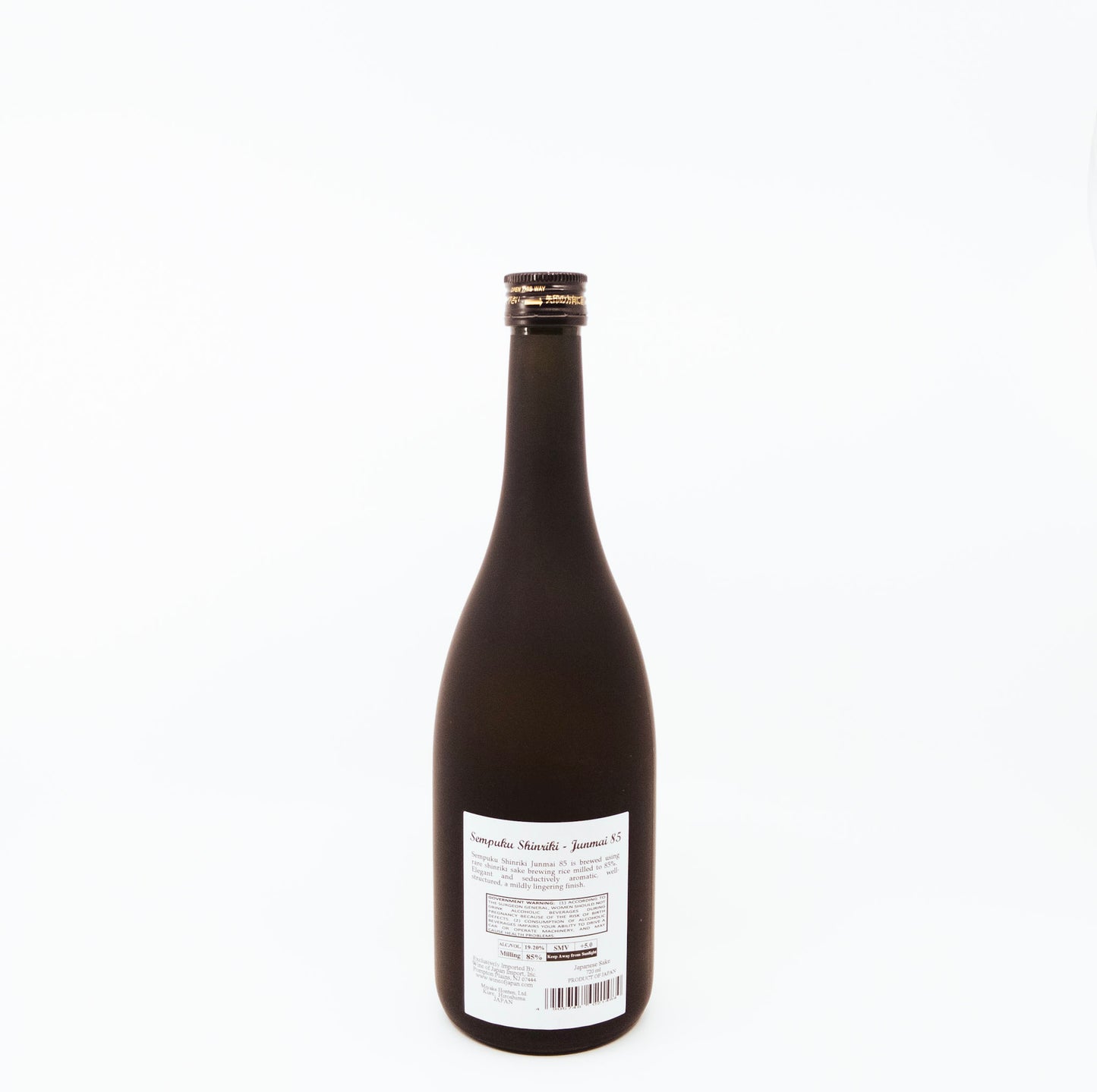 back of dark bottle with yellow label