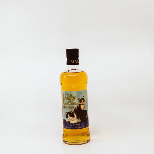 glass bottle with two cats on label