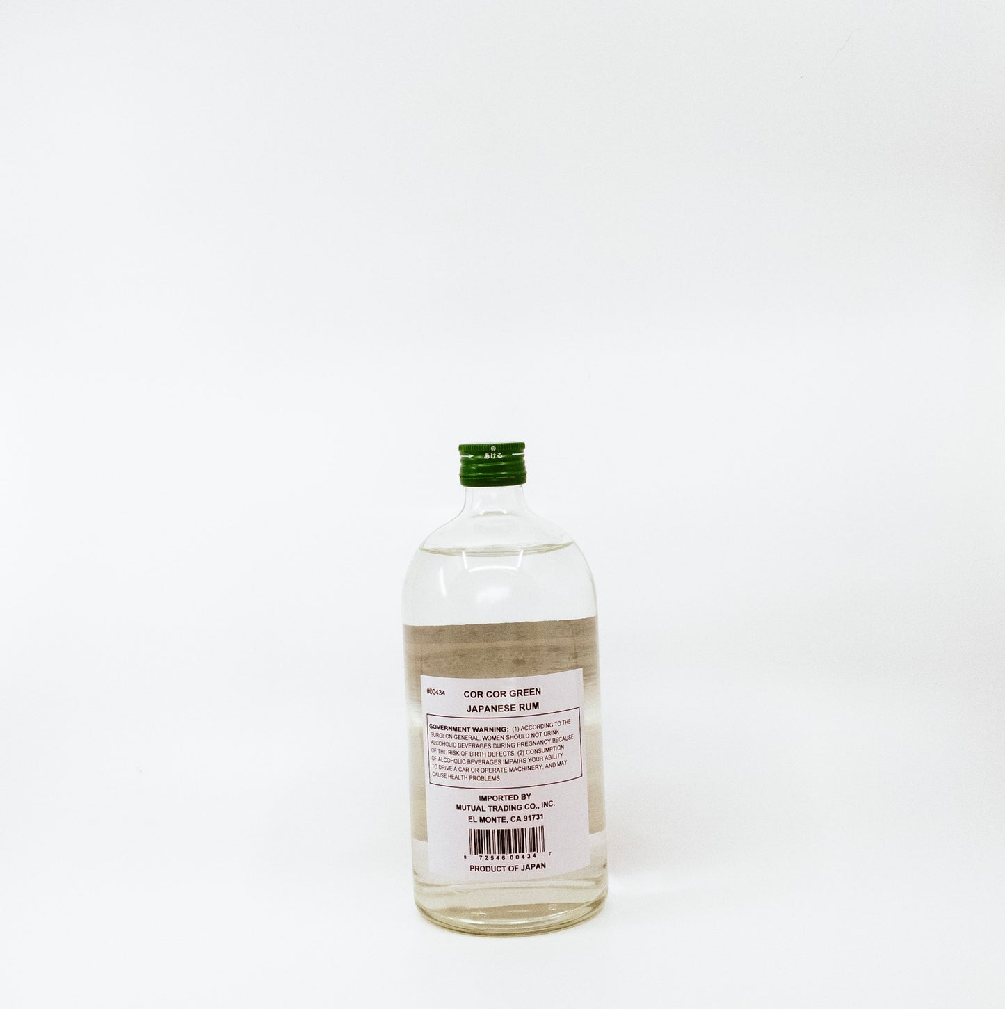 back of short glass bottle with green cap