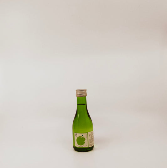 small green glass bottle