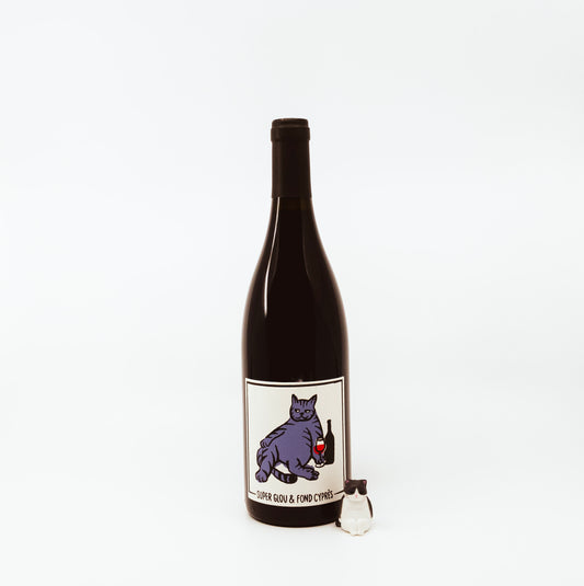 dark wine bottle with cat on label