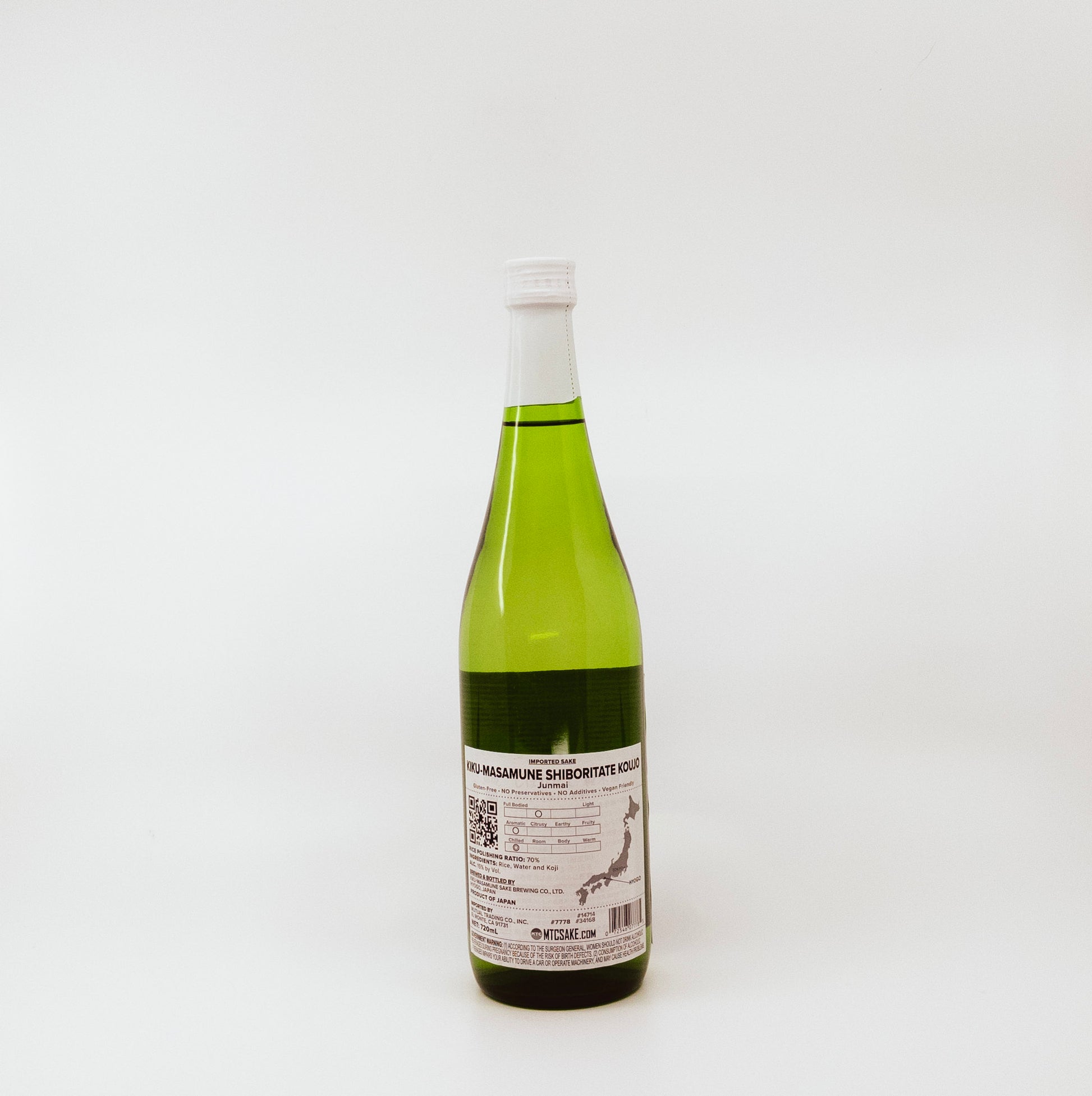 back of glass bottle with teal label