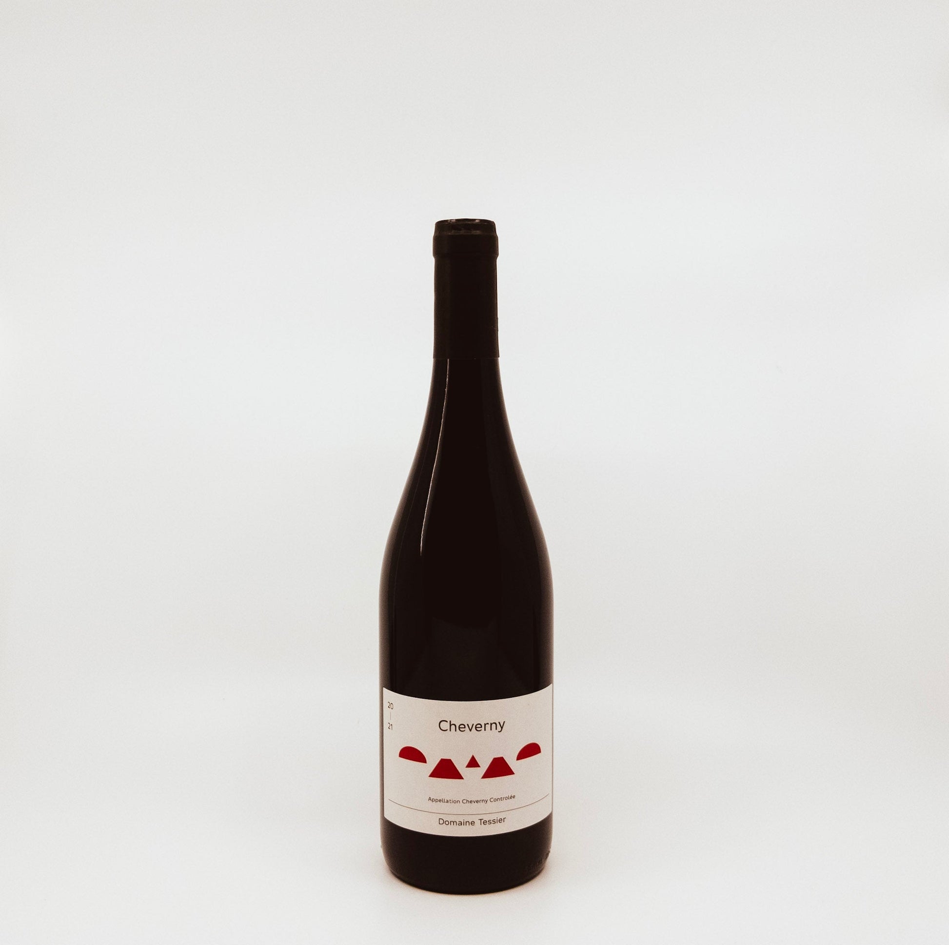 front of dark wine bottle