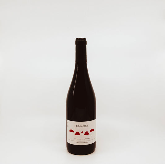 front of dark wine bottle