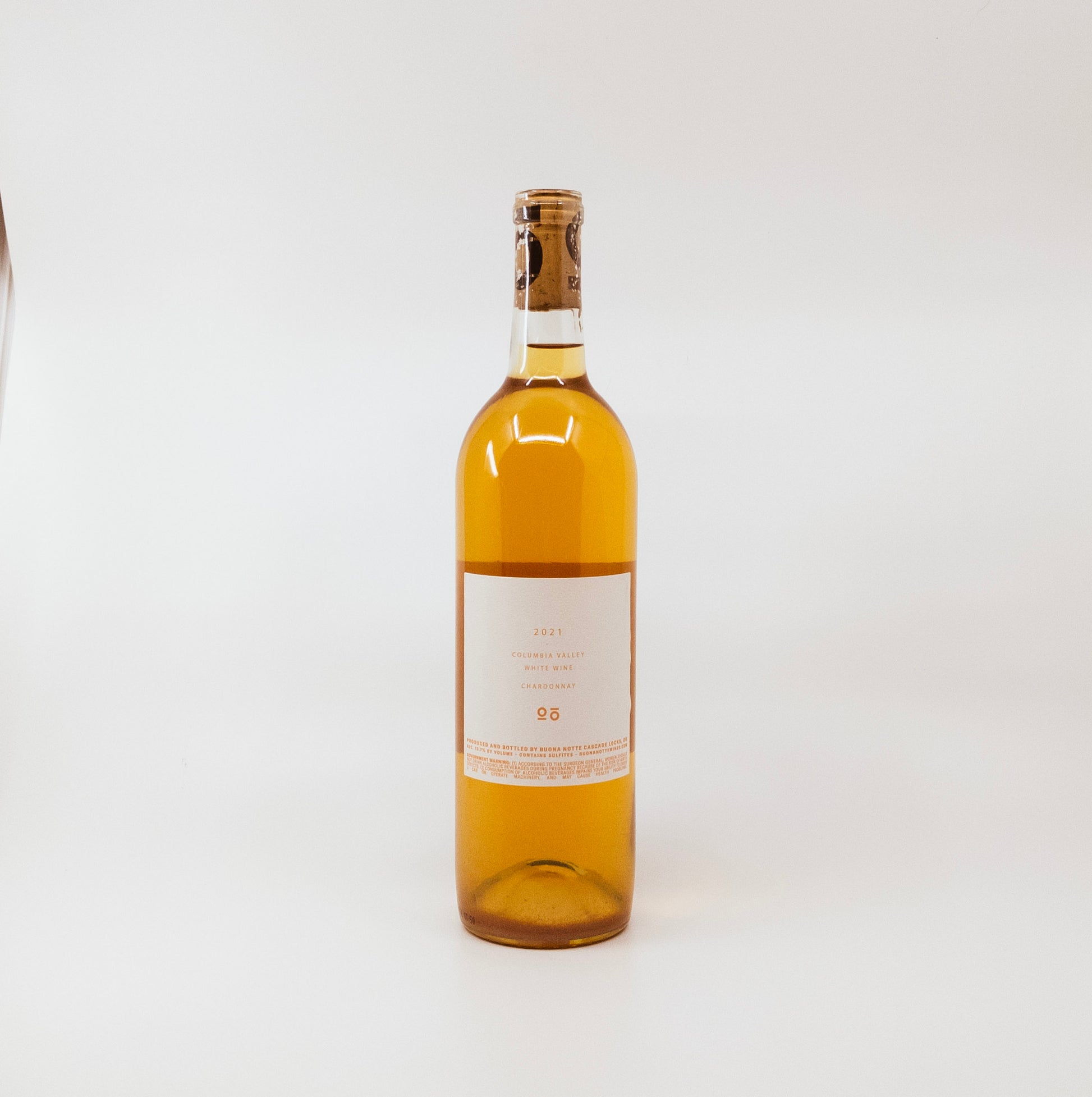 back of yellow wine bottle