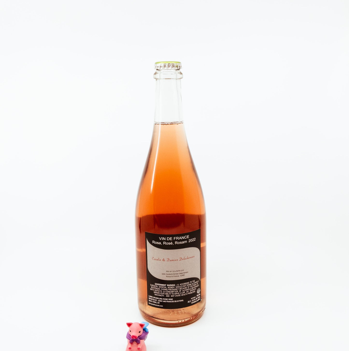 back of wine bottle with drawing on circle label