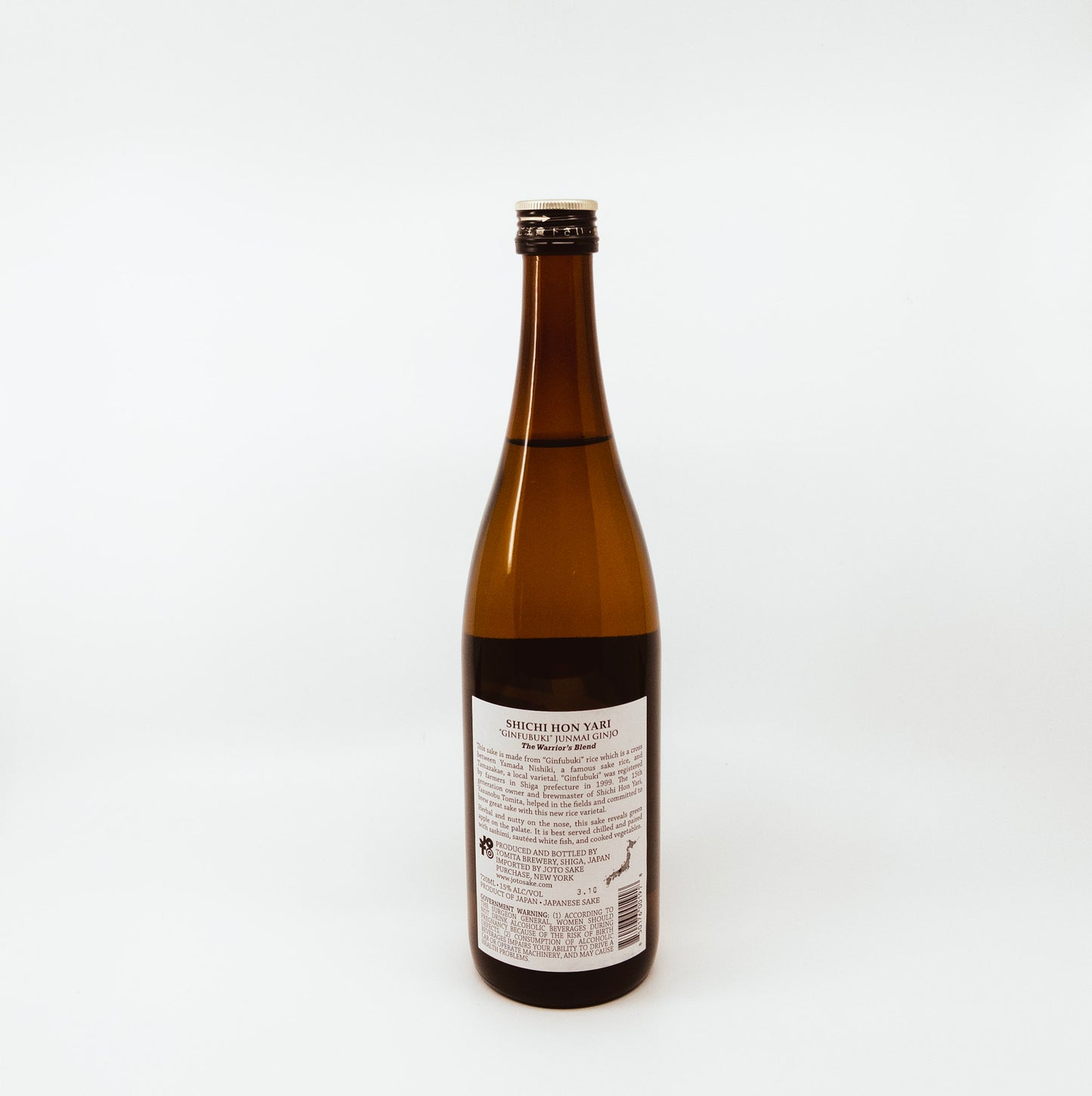 back of glass bottle with white writing on black and grey label