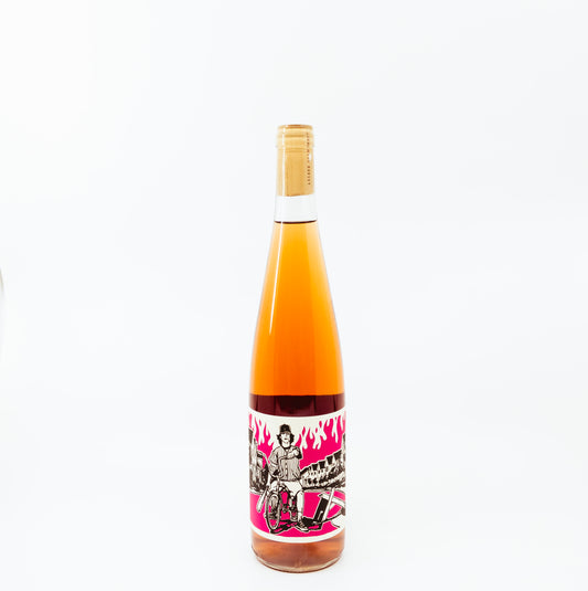 orange glass bottle with flames on label