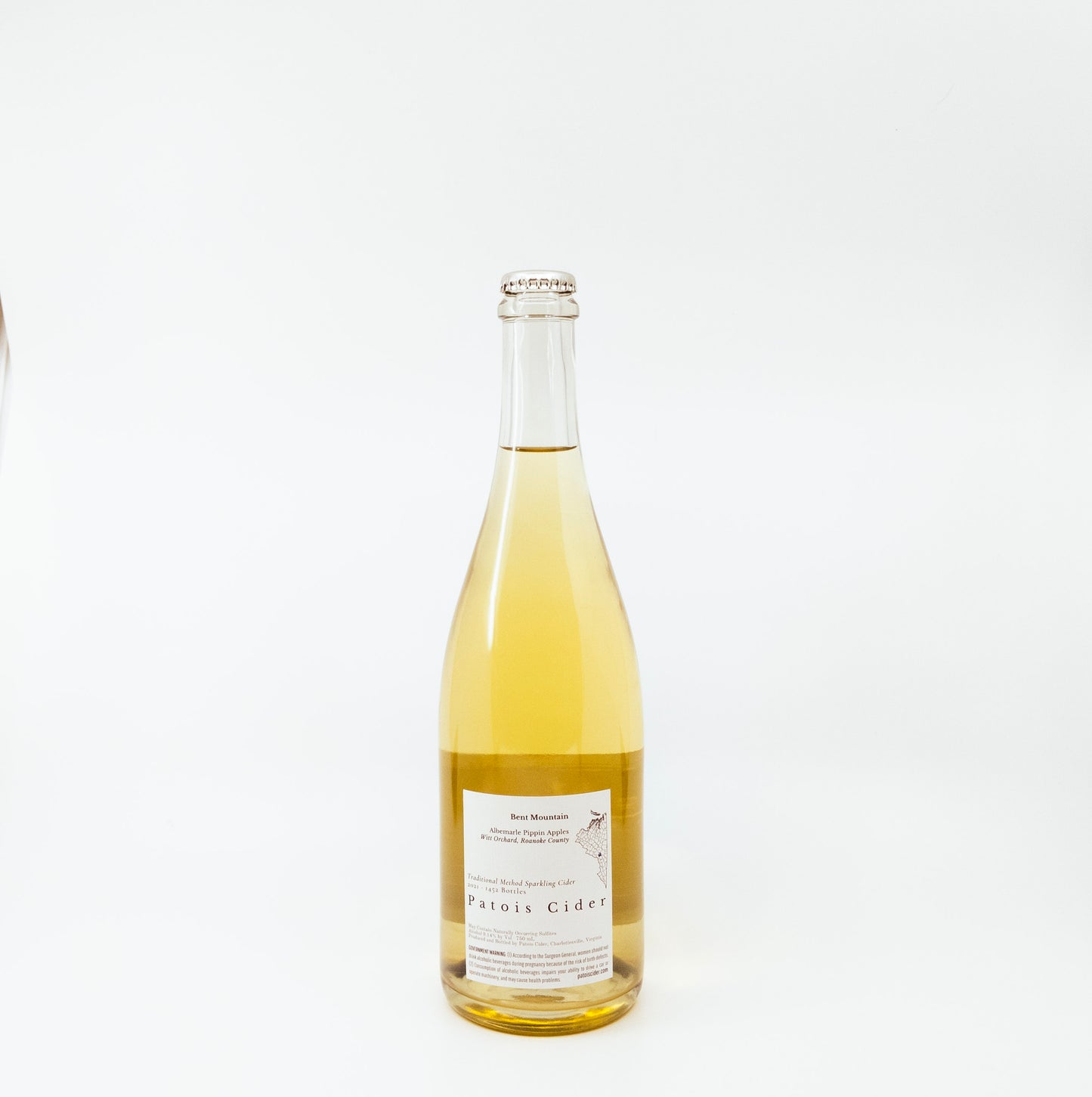 back of yellow glass bottle