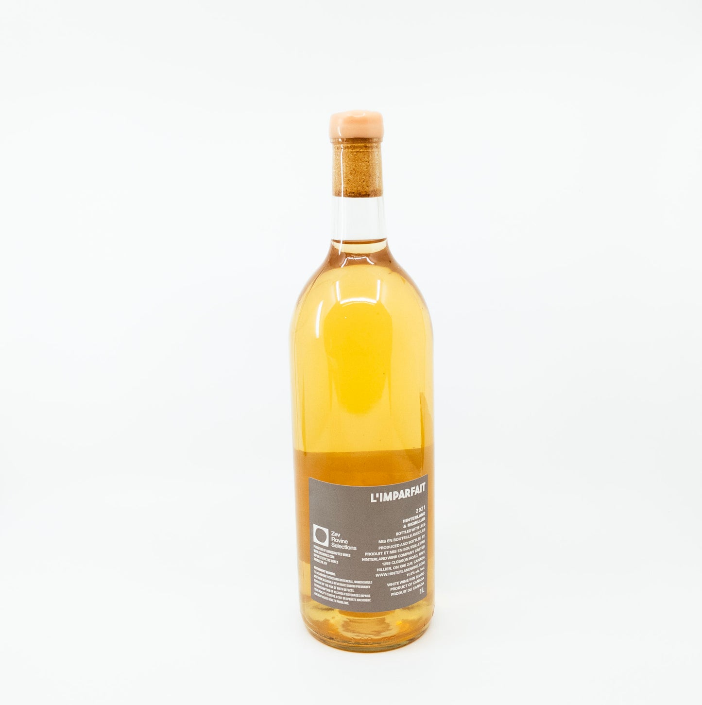 back of wine bottle with clothes on label