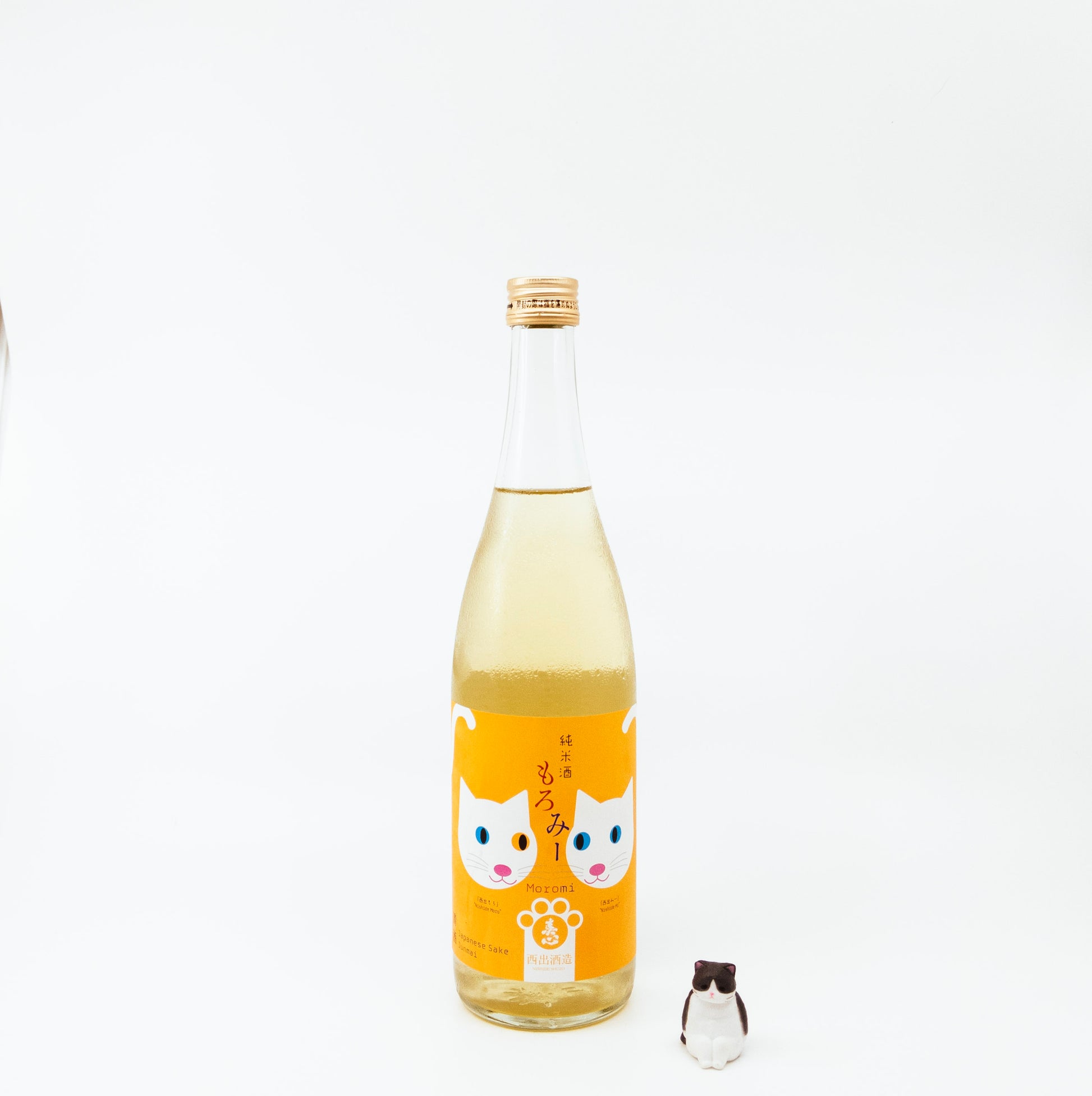 glass bottle with yellow label