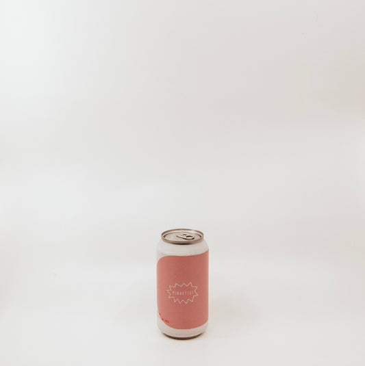 metal can with pink graphic