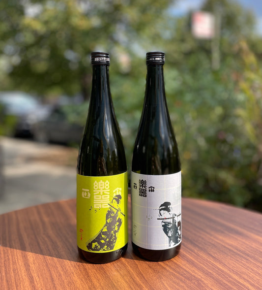 two bottles on wooden table