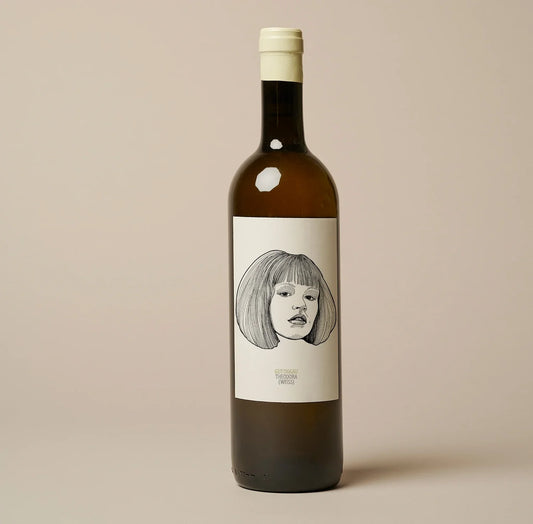 woman with a bob on wine bottle label