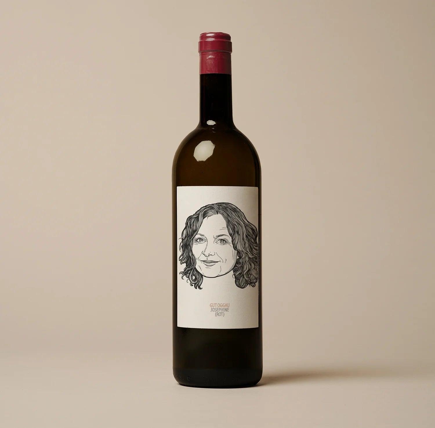 wine bottle with older woman face on label