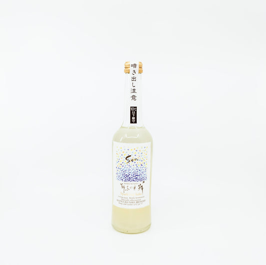white bottle with blue dots on white label