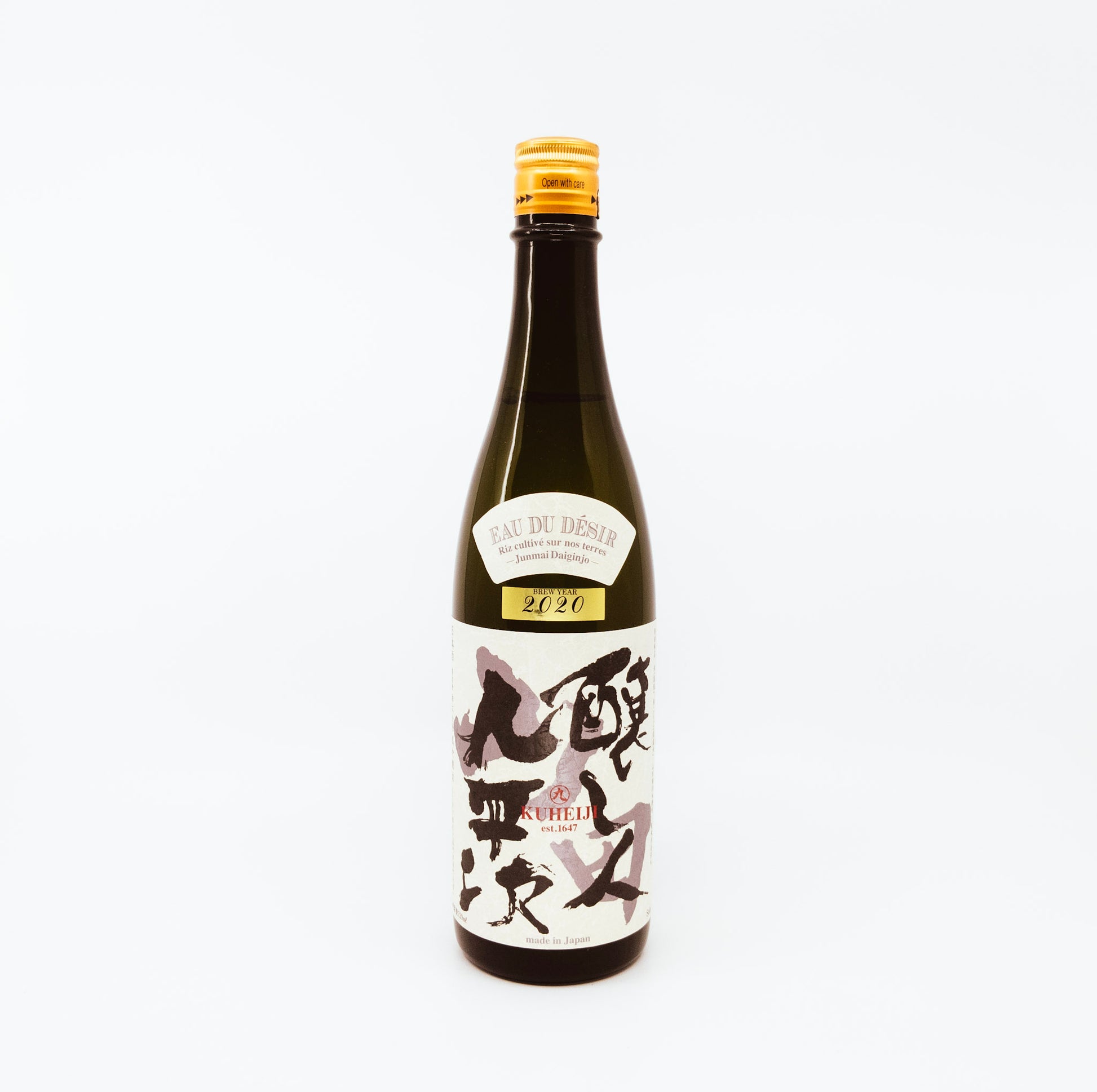 dark bottle with black and grey writing on white label