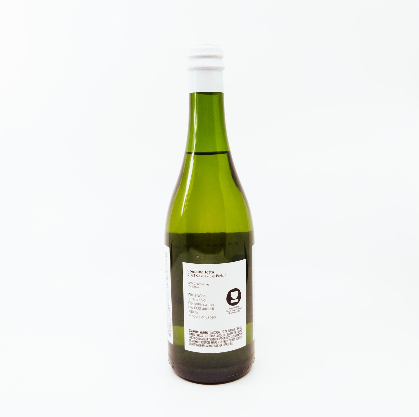 back of green bottle of tetta with white topper