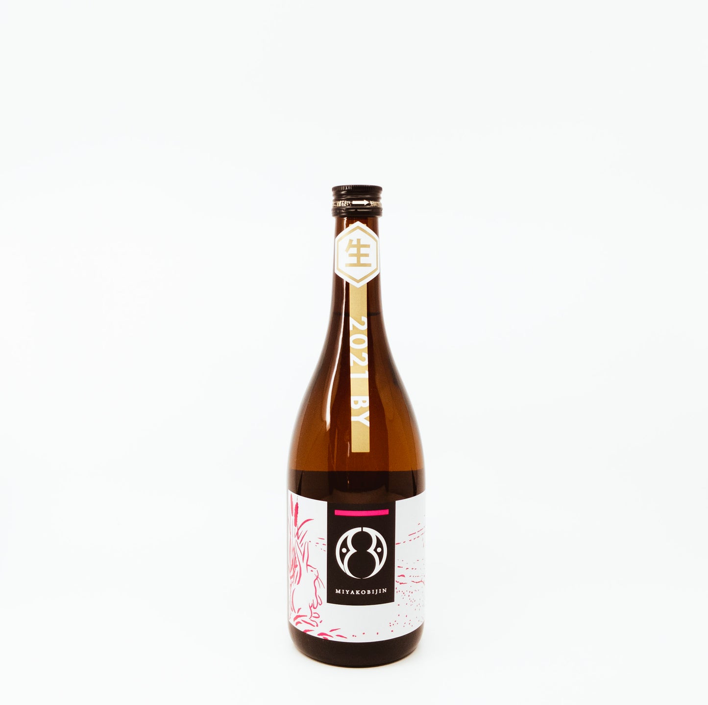 glass bottle with red feathers on label