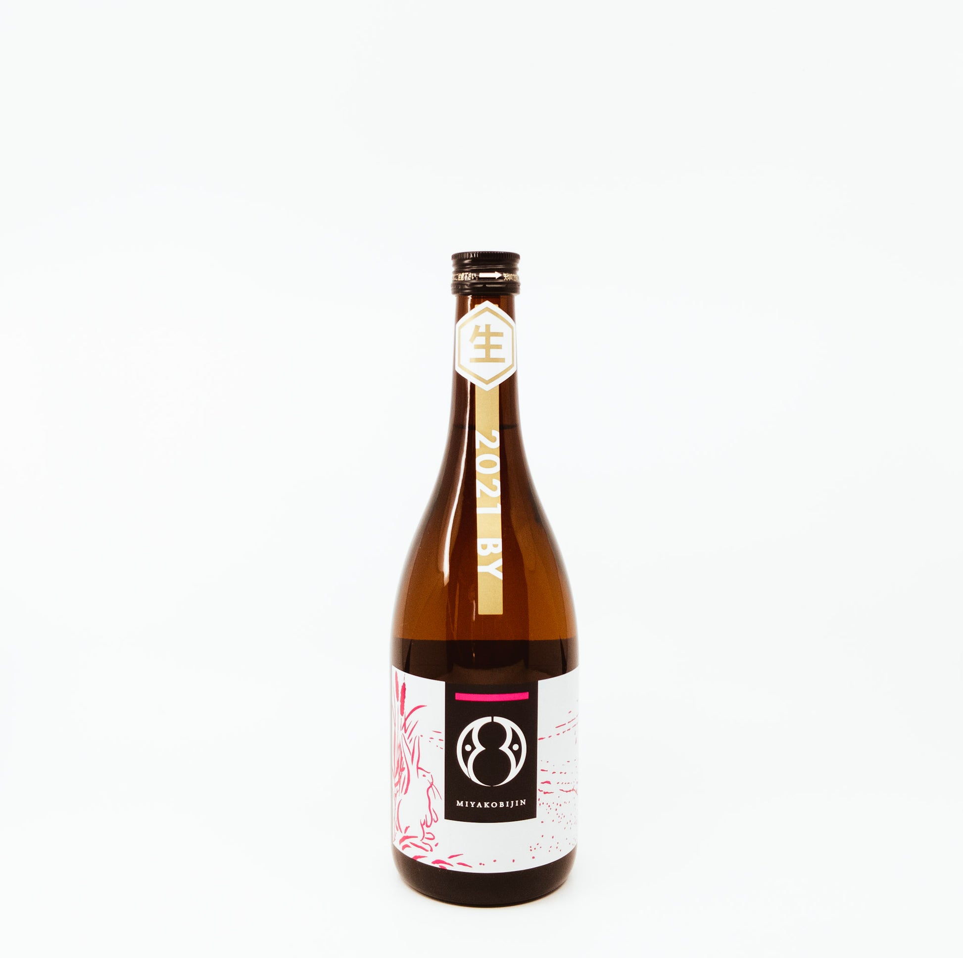 glass bottle with red feathers on label