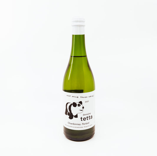 green bottle of tetta with white topper