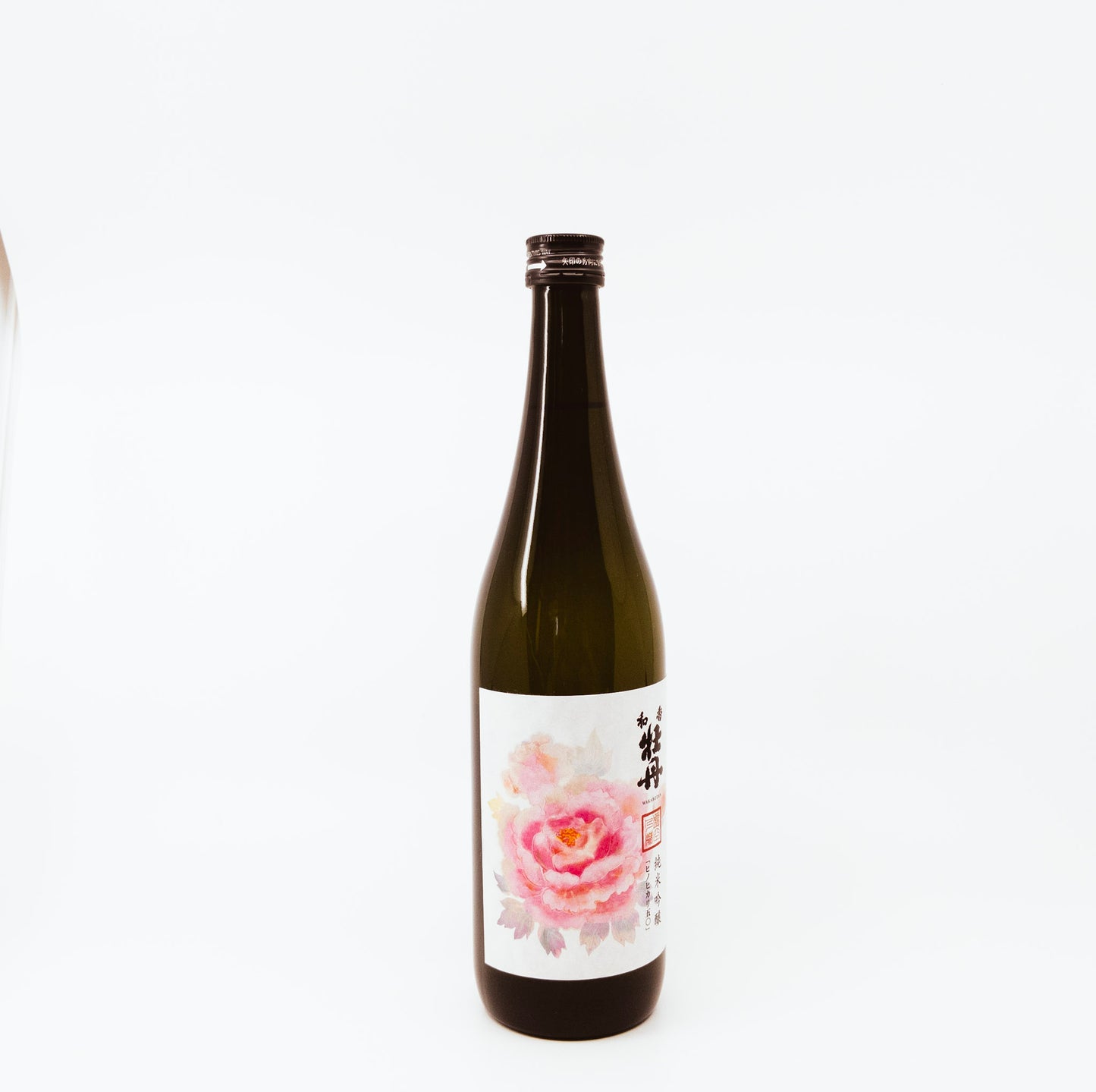 glass bottle with pink rose on label