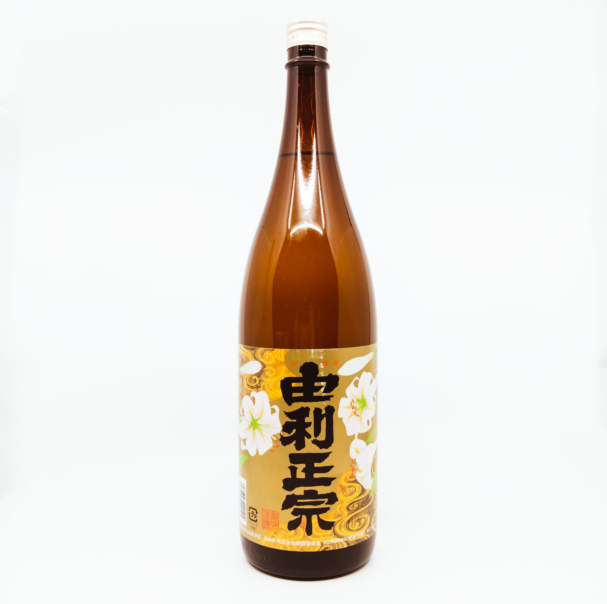 large brown bottle with white flowers on brown label