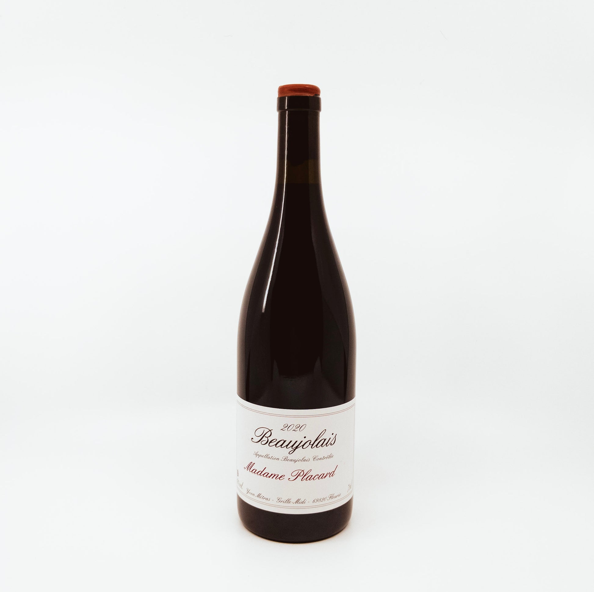 bottle with cursive writing on label