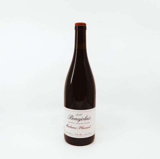 bottle with cursive writing on label