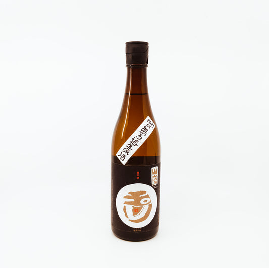 bottle with black label and white circle