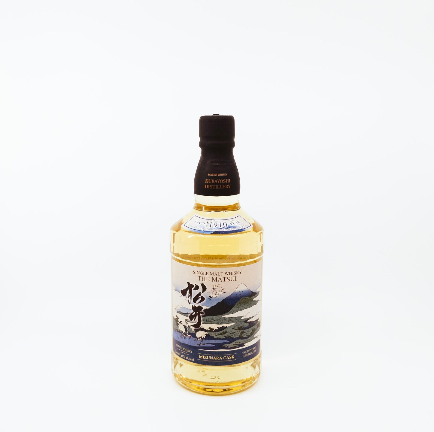 bottle of whisky with mountain view on label