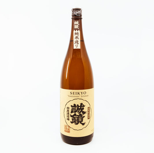 large brown bottle with cream label