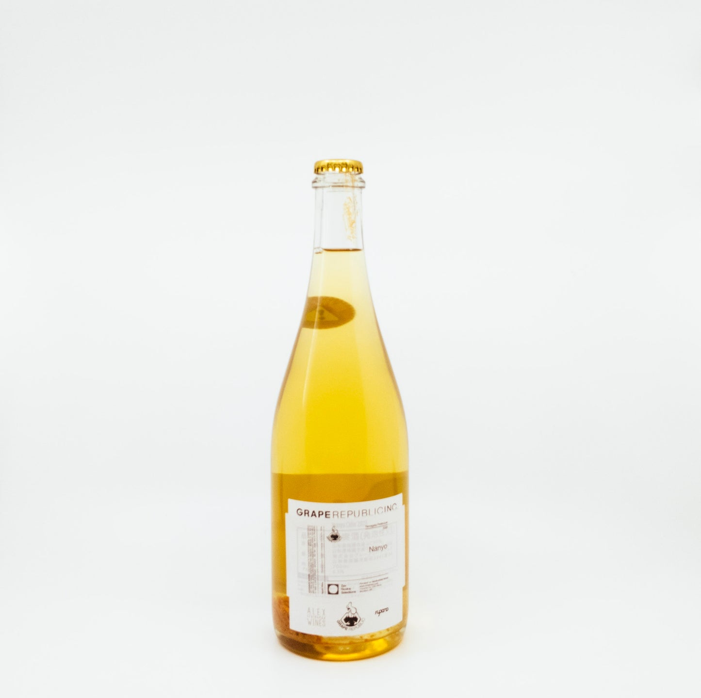 back of bottle with apple and pear on label