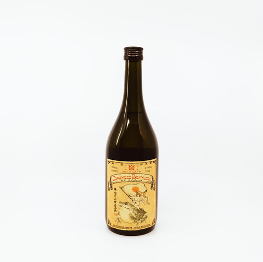 dark bottle with toad on cream label