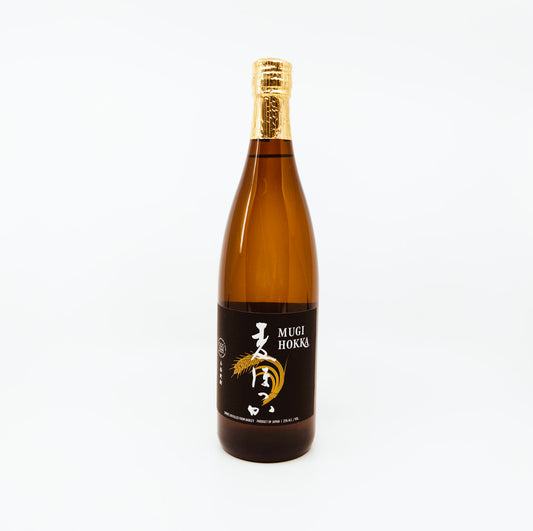 bottle with black label and gold topper