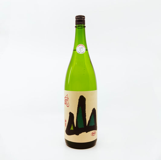 green bottle with three triangles on label