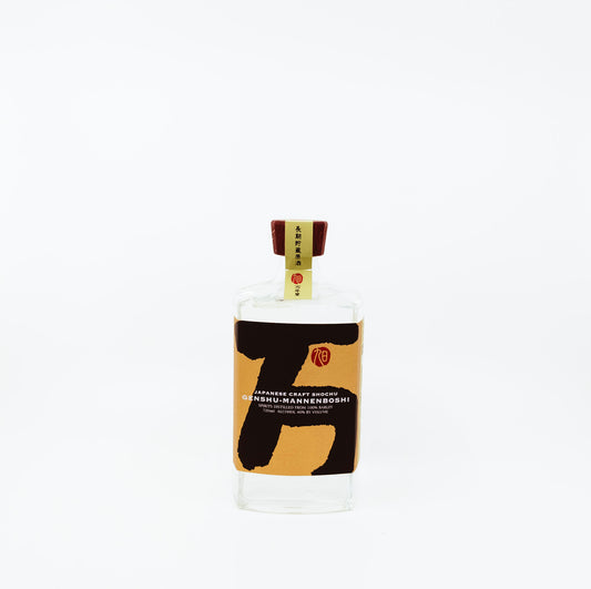 short bottle with yellow label