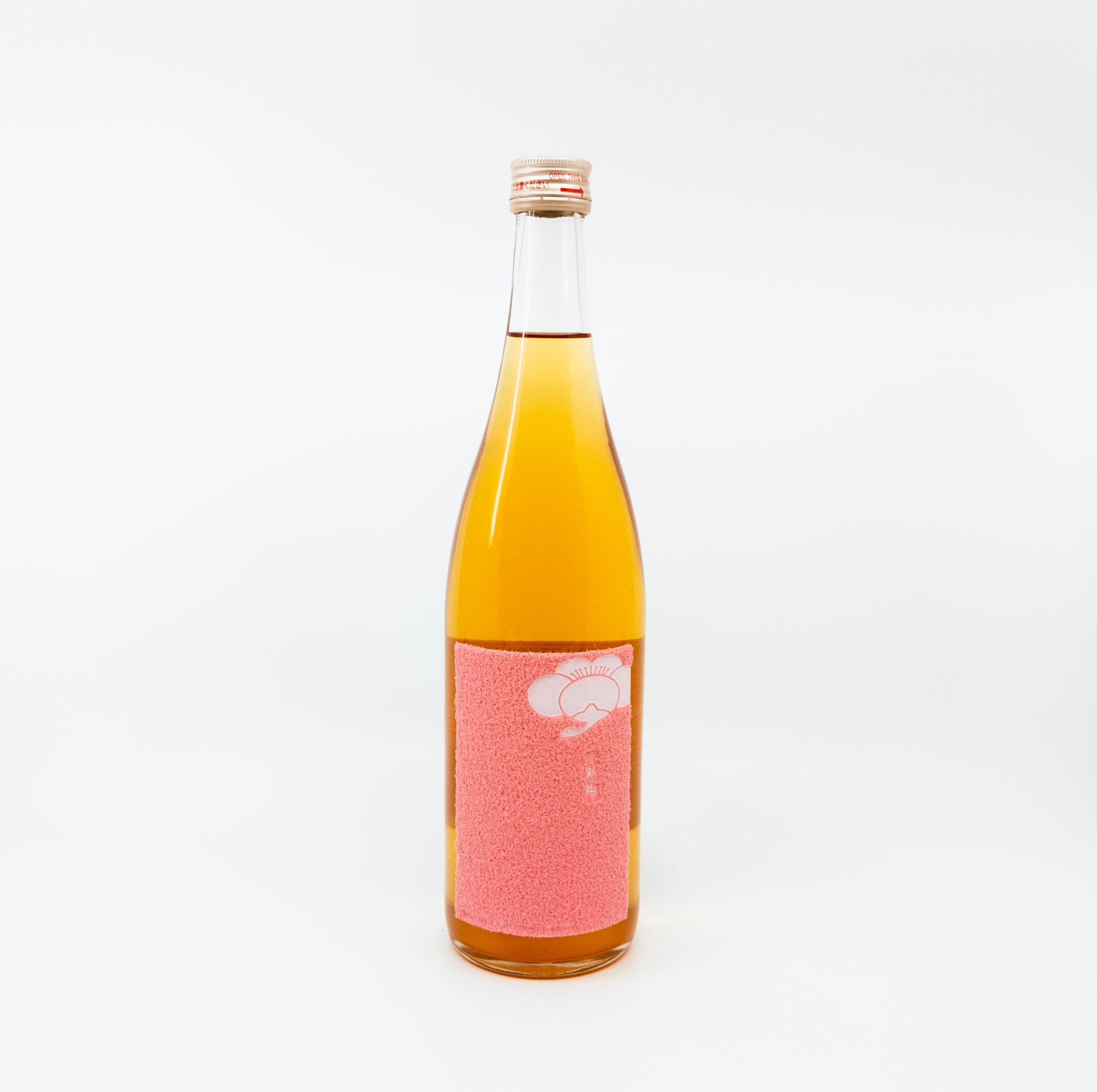 bottle with pink square label