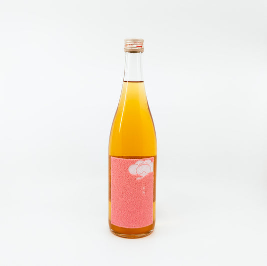 bottle with pink square label
