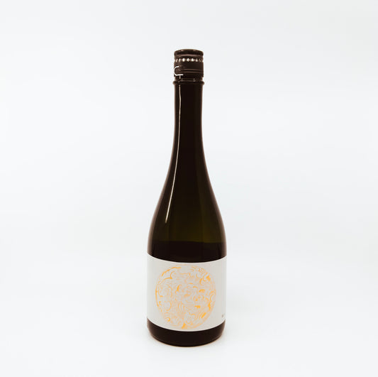 black bottle with yellow circle on white label