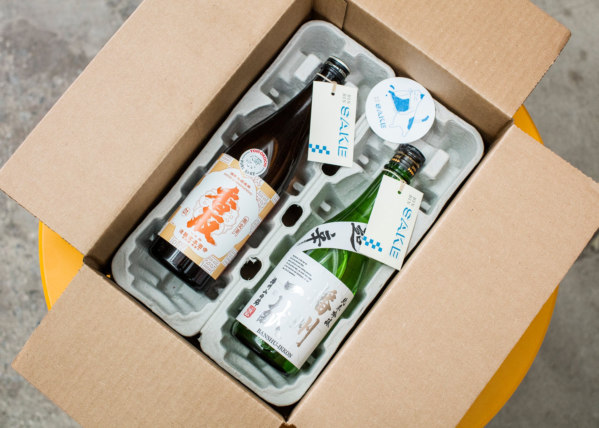 aerial view of two bottles packed in box